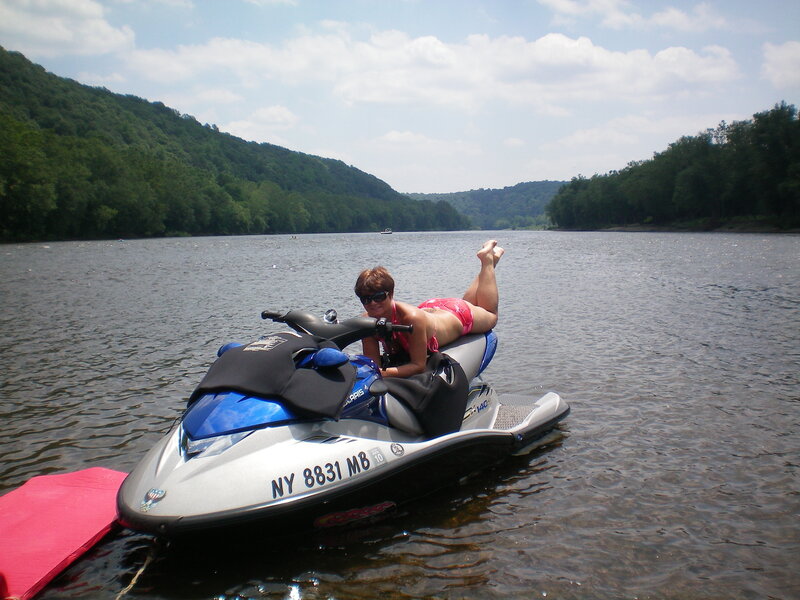 Woman on jet ski in river