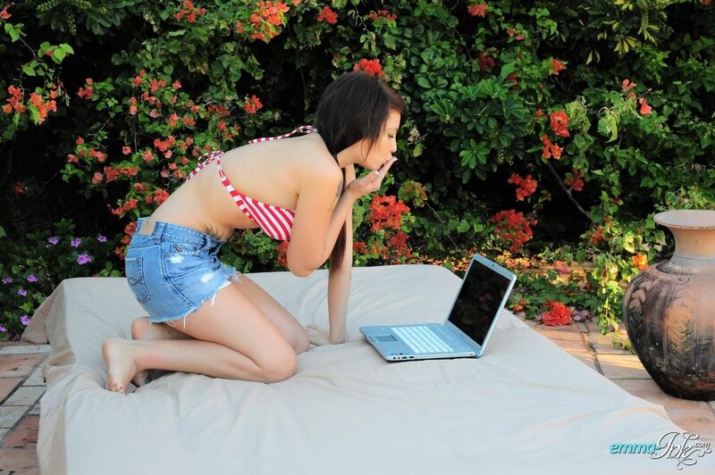 woman on laptop outdoors