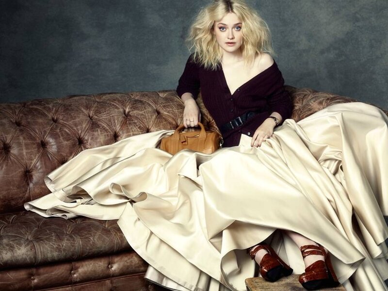 Woman on Leather Couch — Brown, Dramatic, Photograph