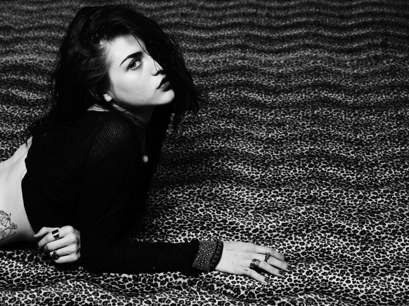 woman on leopard print surface