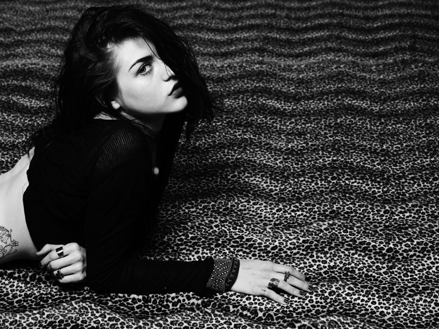 woman on leopard print surface