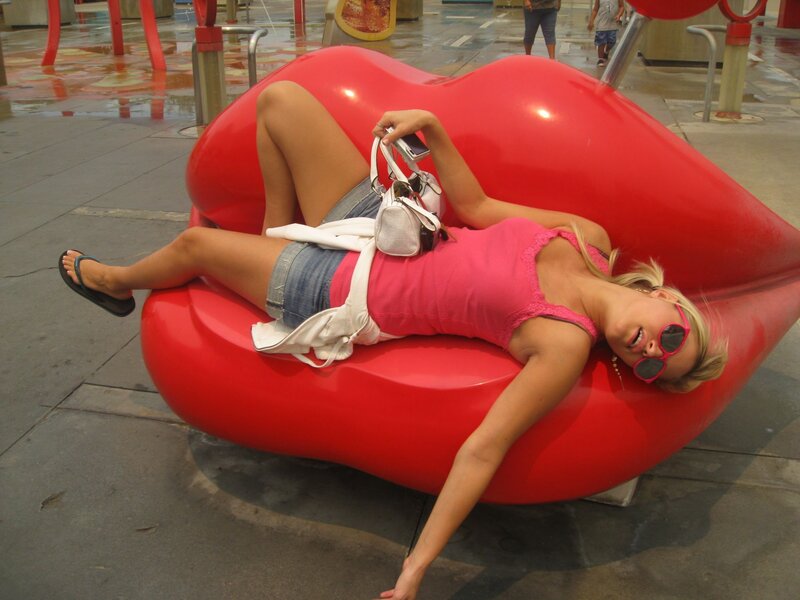 Woman on Lip-shaped Bench