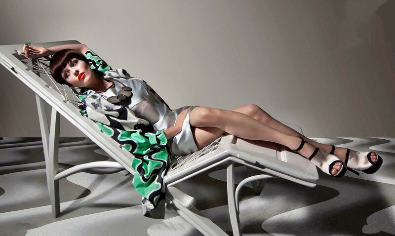 Woman on Lounge Chair — White, Dramatic