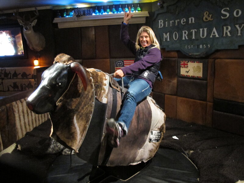 Woman on Mechanical Bull — Brown, Playful