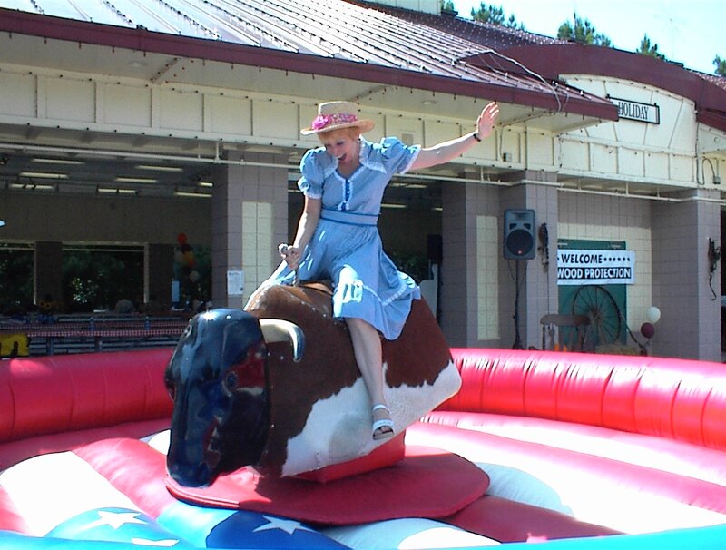 Woman on Mechanical Bull — Red, Playful, Afternoon
