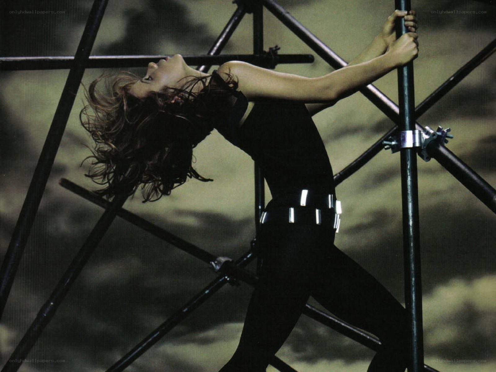 woman on metal structure