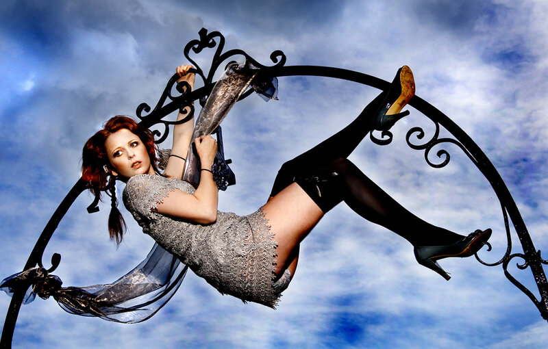 Woman on Metal Structure — Blue