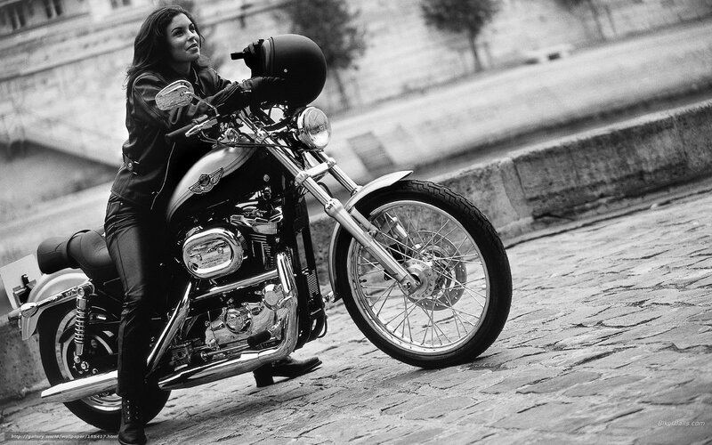 Woman on Motorcycle — Black, Confident, Photograph, Cobblestone Street