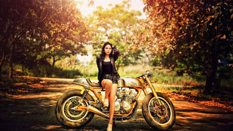 Woman on Motorcycle — Gold, Dramatic