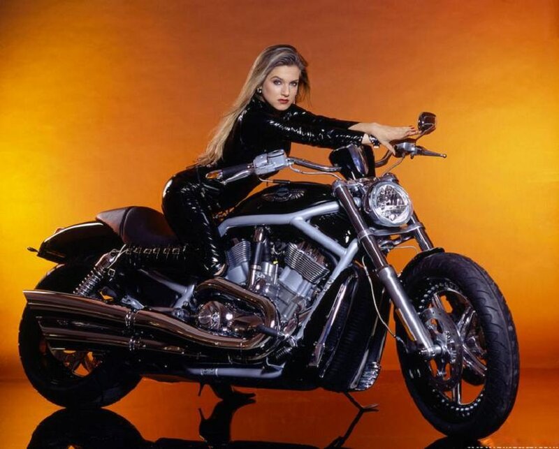 Woman on Motorcycle — Orange, Dramatic