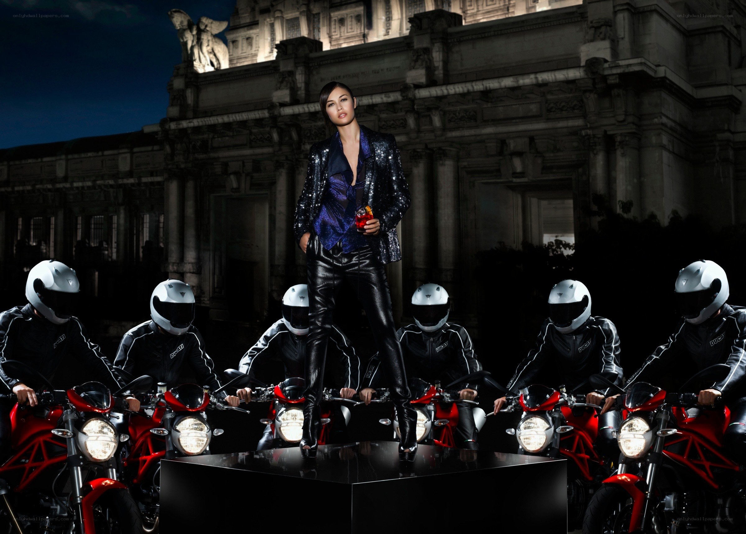 Woman on motorcycle platform
