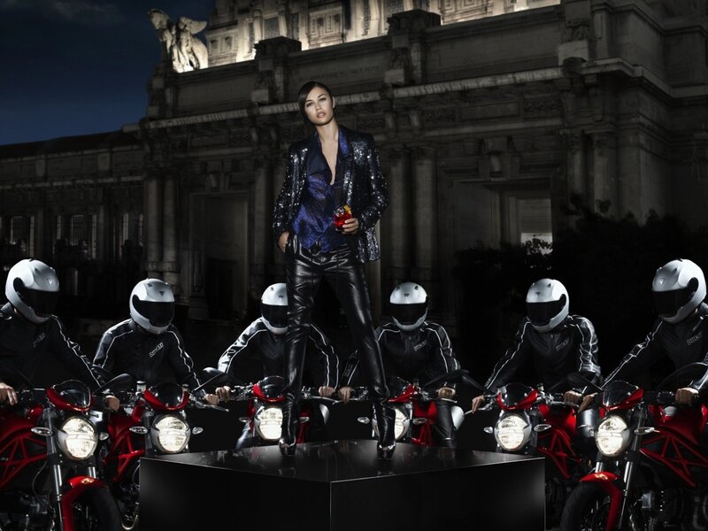 Woman on motorcycle platform