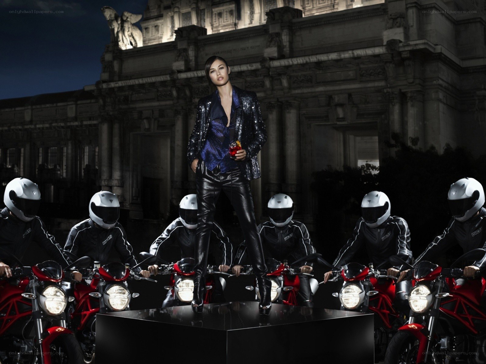 Woman on motorcycle platform