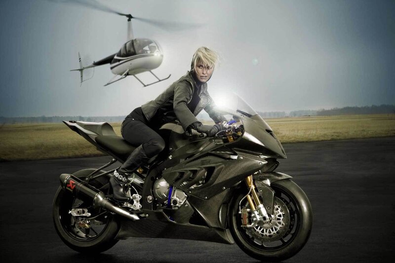 woman on motorcycle with helicopter