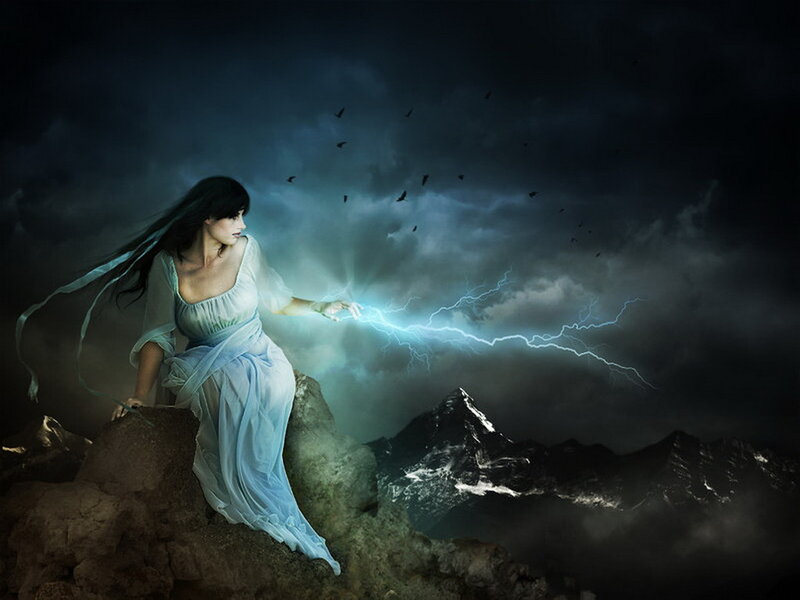 Woman on Mountain Peak — Blue, Dramatic