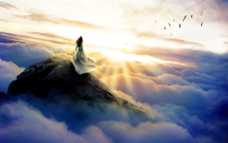 Woman on Mountain Peak — Blue