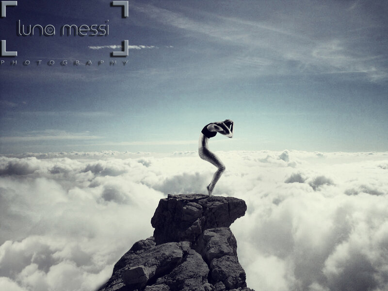 Woman on Mountain Peak — Gray