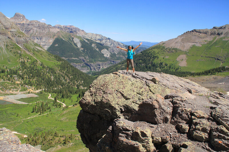 Woman on Mountain Peak — Green