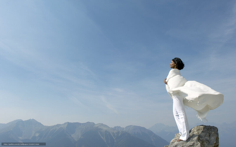Woman on mountain peak