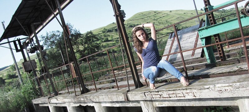 Woman on old bridge