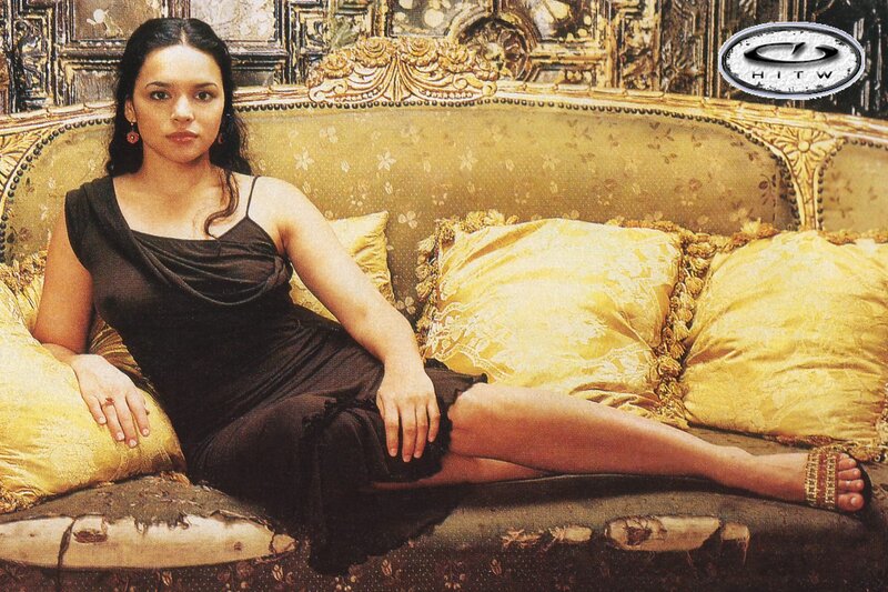 Woman on Ornate Couch — Black, Dramatic, Photograph, Pillows