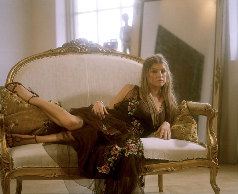 Woman on Ornate Sofa — Brown, Dramatic