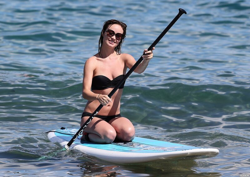 Woman on paddleboard in ocean