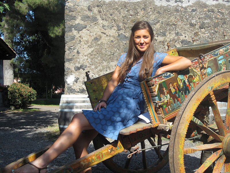 Woman on Painted Cart