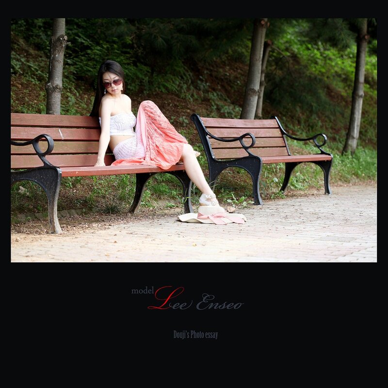 Woman on park bench