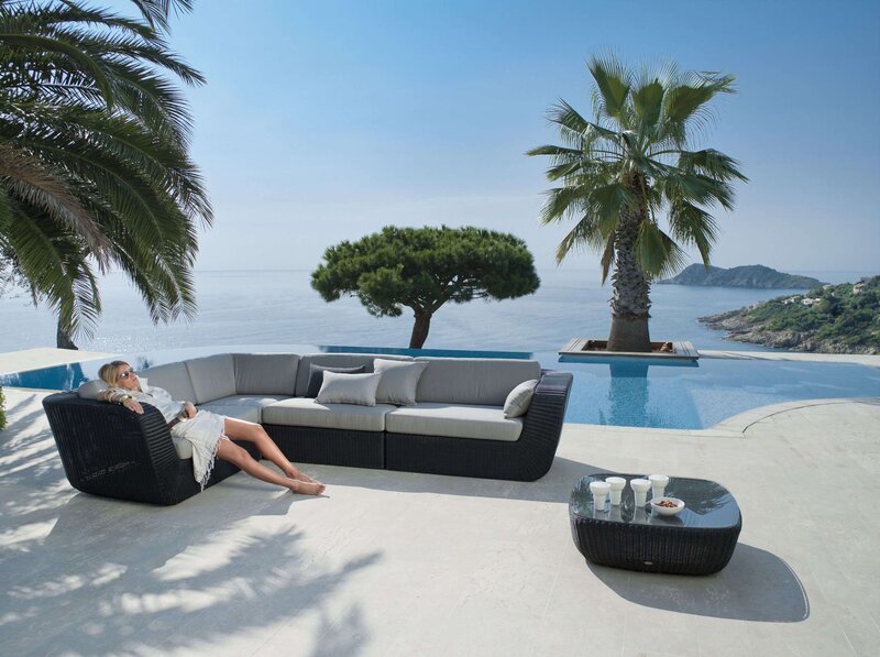 Woman on Patio Sofa