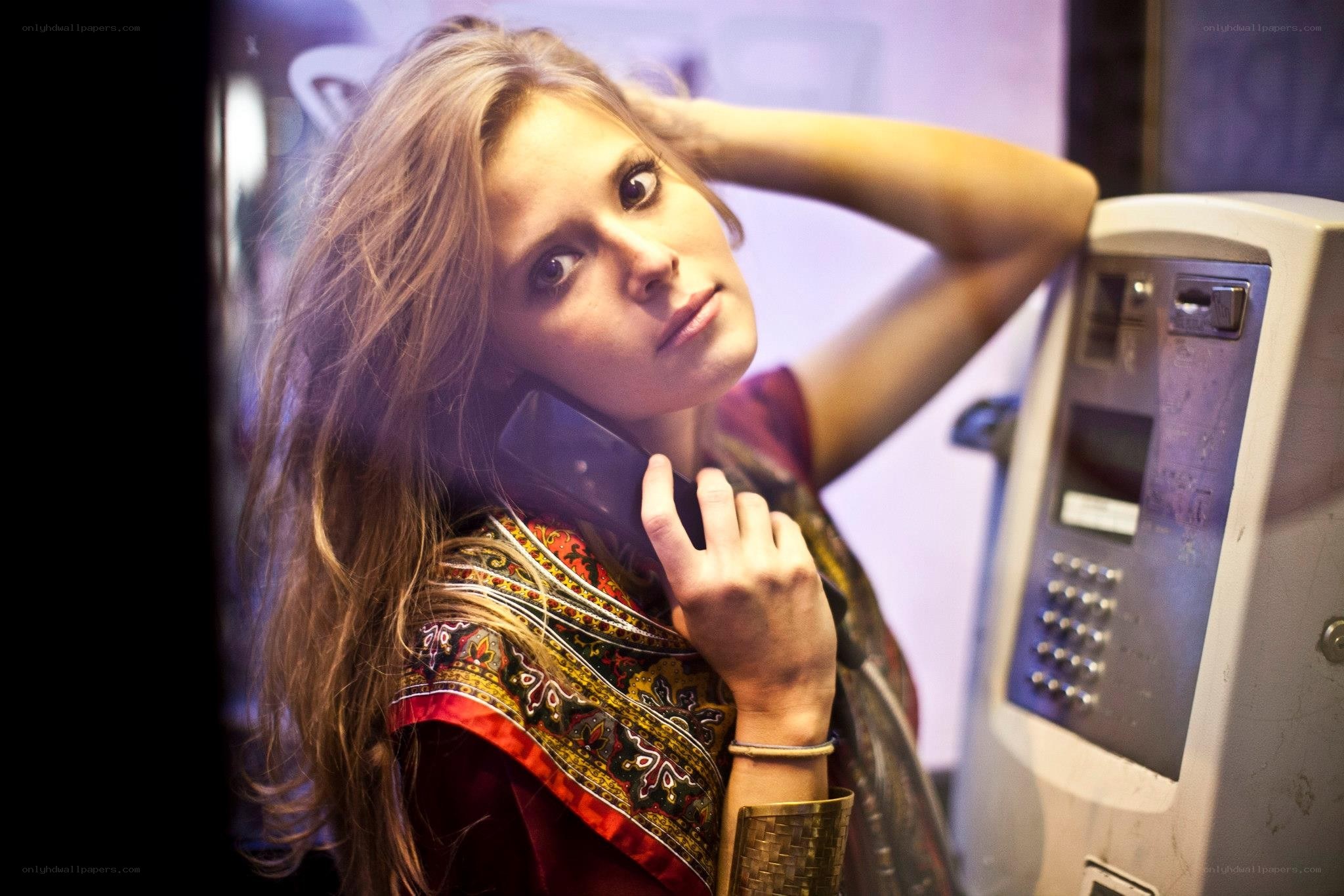 woman on payphone