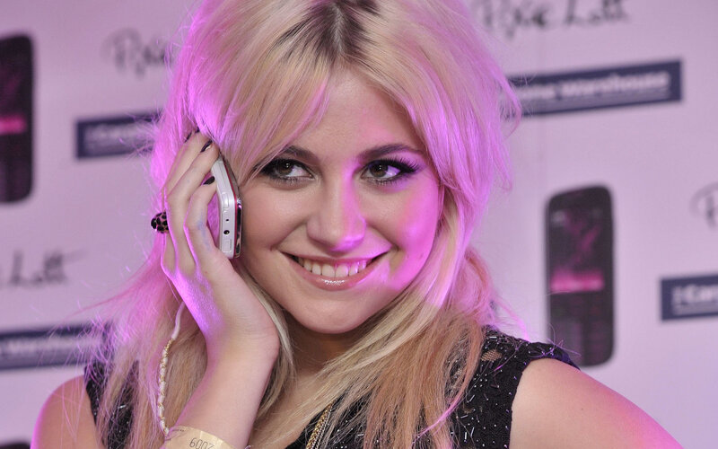 woman on phone at event