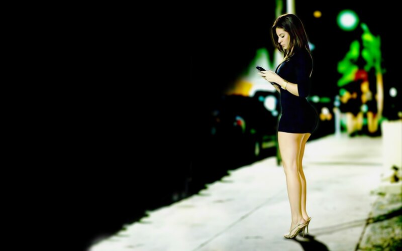 woman on phone at night