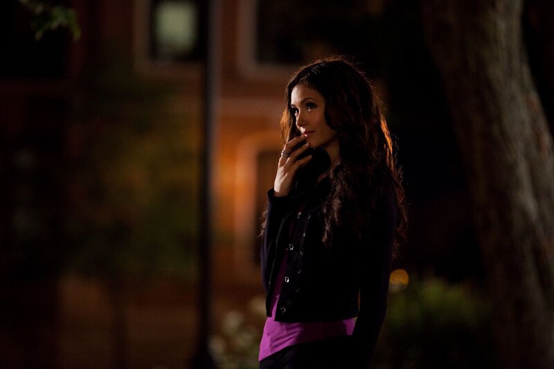 woman on phone at night