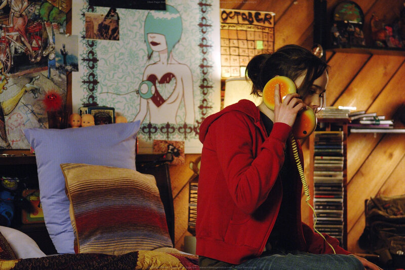 woman on phone in bedroom