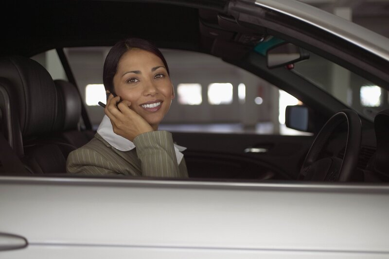 Woman on phone in car