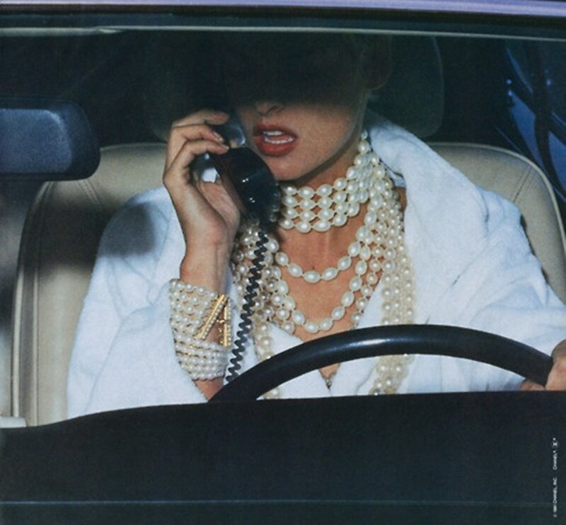 Woman on Phone in Car — White