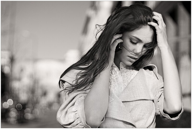 woman on phone in wind