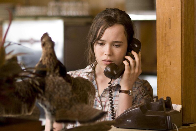Woman on phone with bird