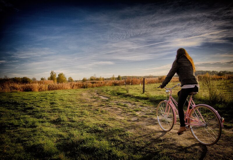 Woman on Pink Bicycle — Green