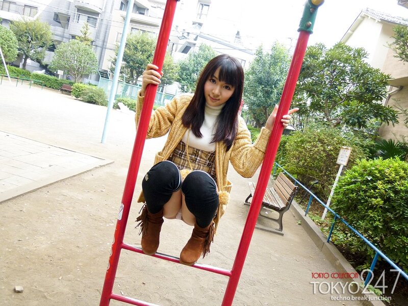 Woman on Playground Ladder