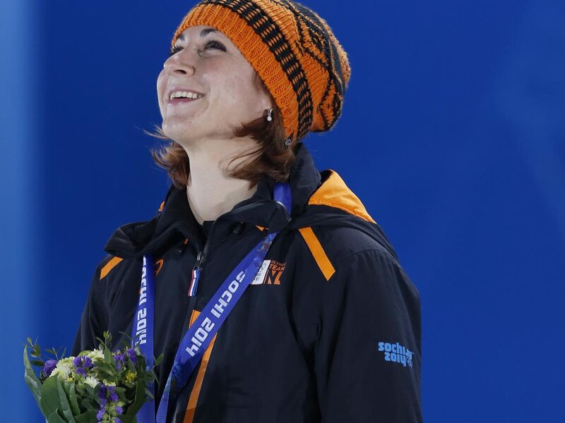Woman on Podium