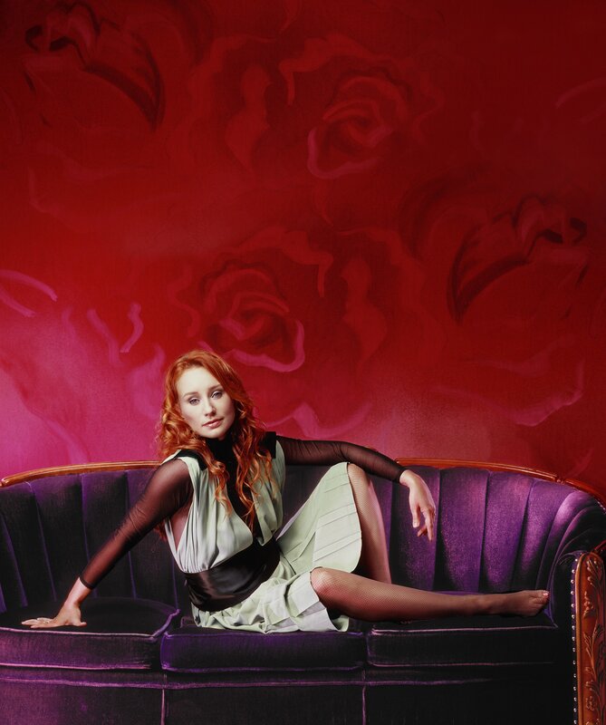 woman on purple couch