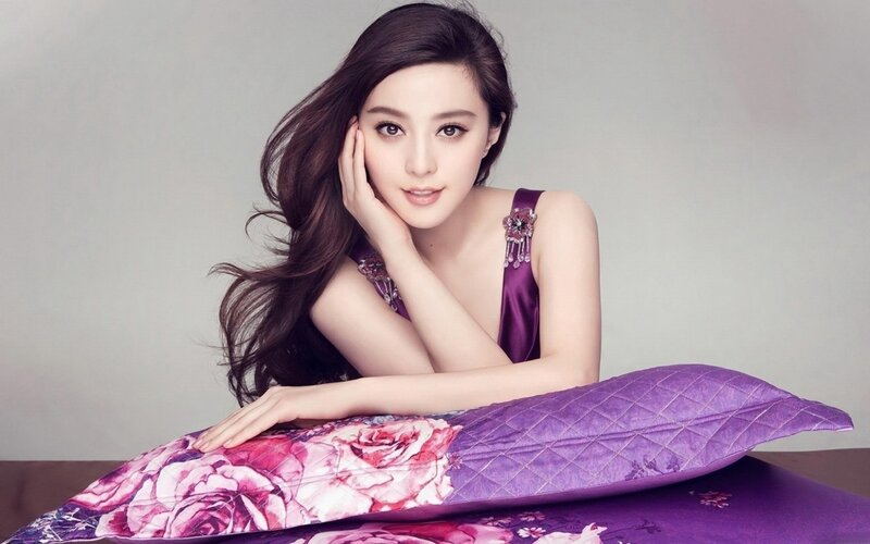 woman on purple pillow