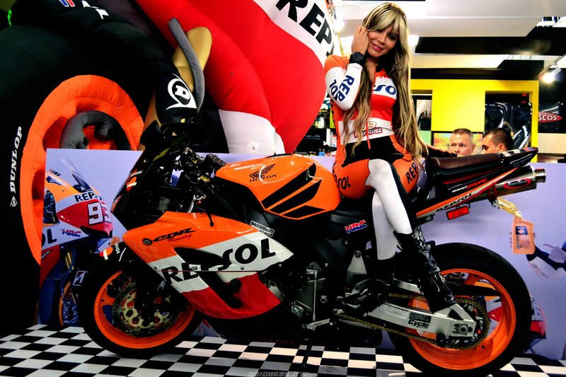 Woman on Racing Motorcycle