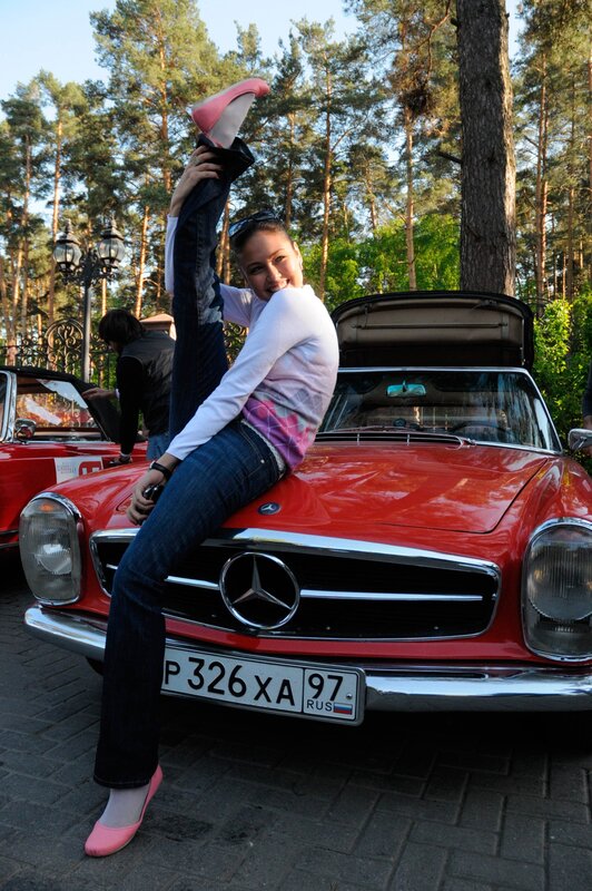 Woman on Red Car — Playful