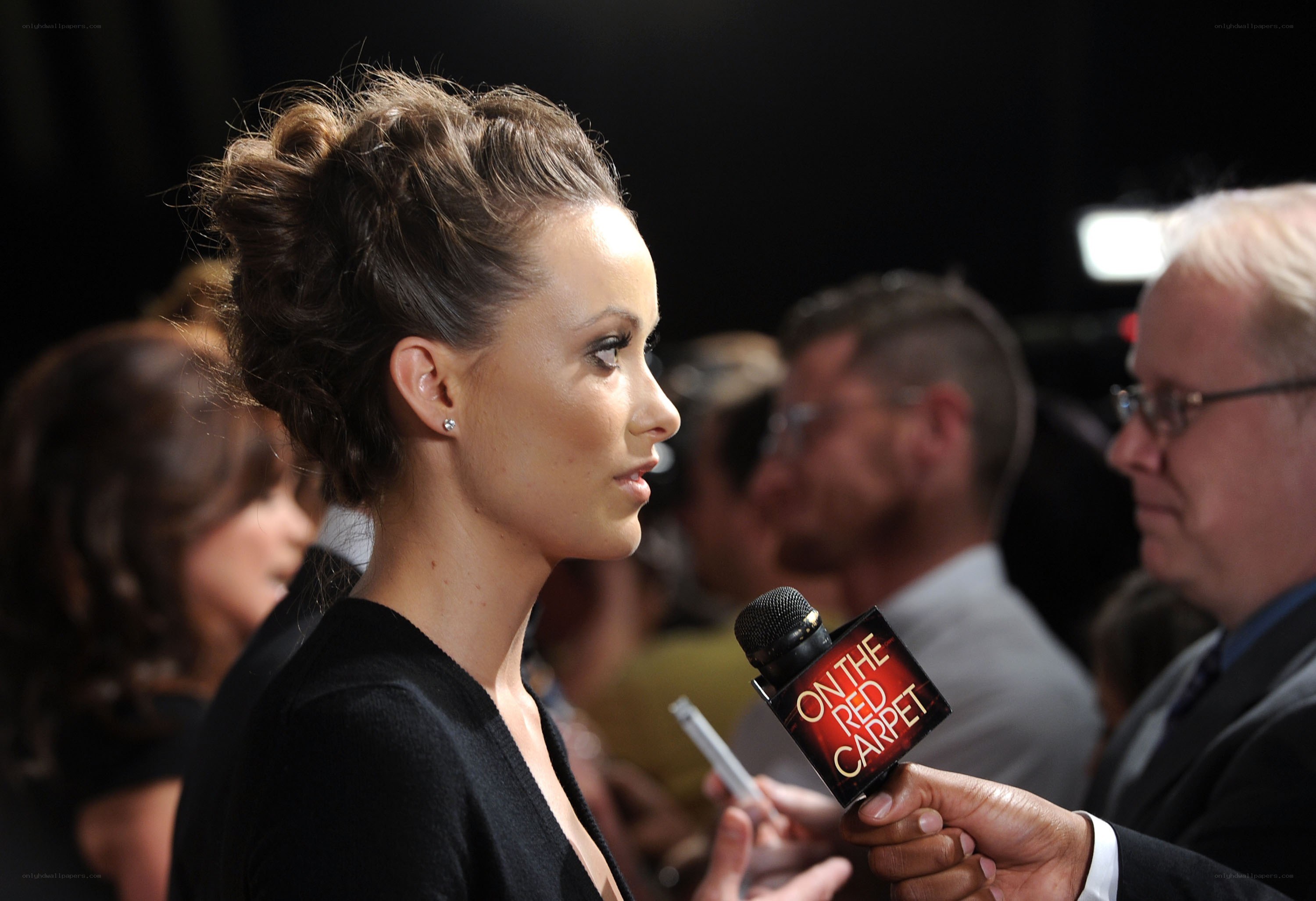 woman on red carpet interview