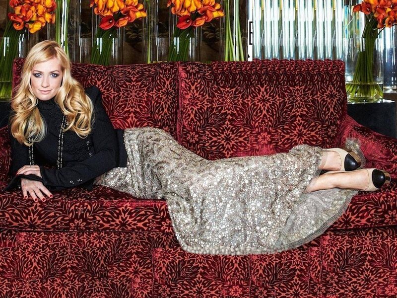 Woman on Red Couch — Stylish
