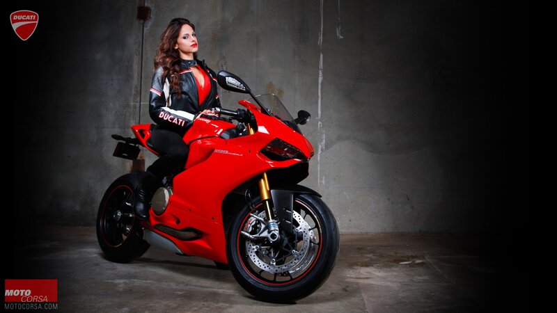 Woman on red Ducati motorcycle