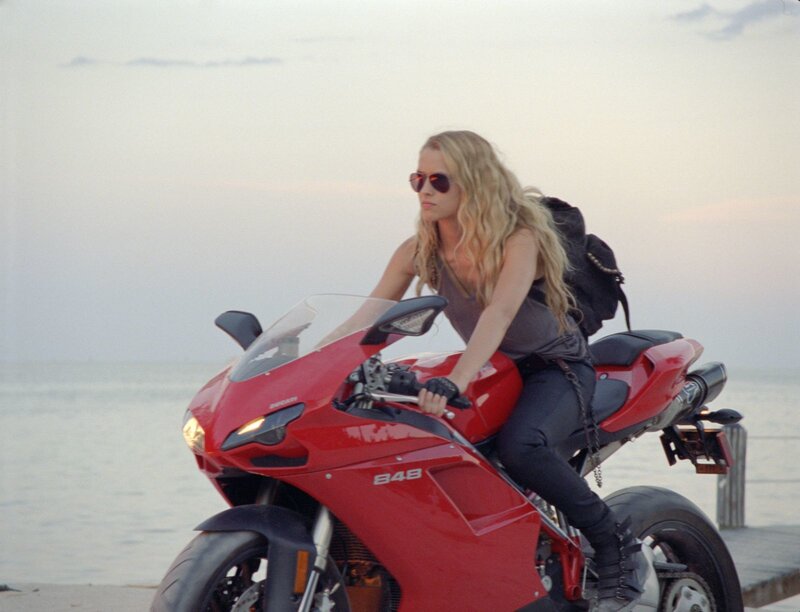 Woman on Red Motorcycle — Calm